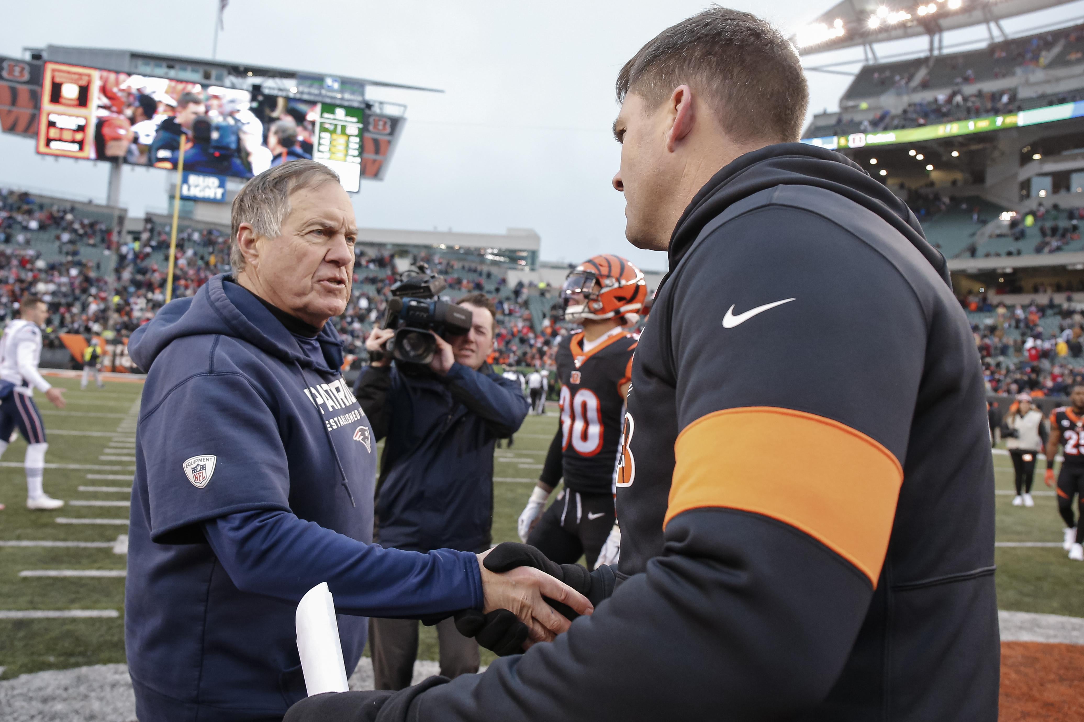 CINCINNATI, OH - DECEMBER 15: Head coach Bill Belichick of the New England Patriots and Head coach Zac Taylor of the Cincinnati Bengals shake hands following the game at Paul Brown Stadium on December 15, 2019 in Cincinnati, Ohio. (Photo by Michael Hickey/Getty Images)
