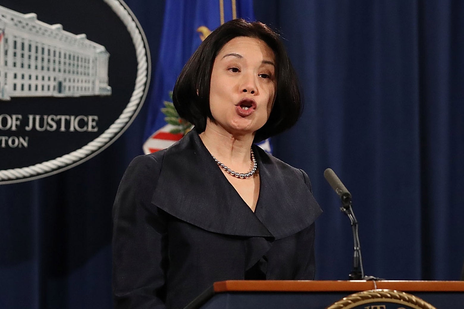 U.S. Attorney Jessie Kong Liu speaks during a news conference at the Department of Justice.