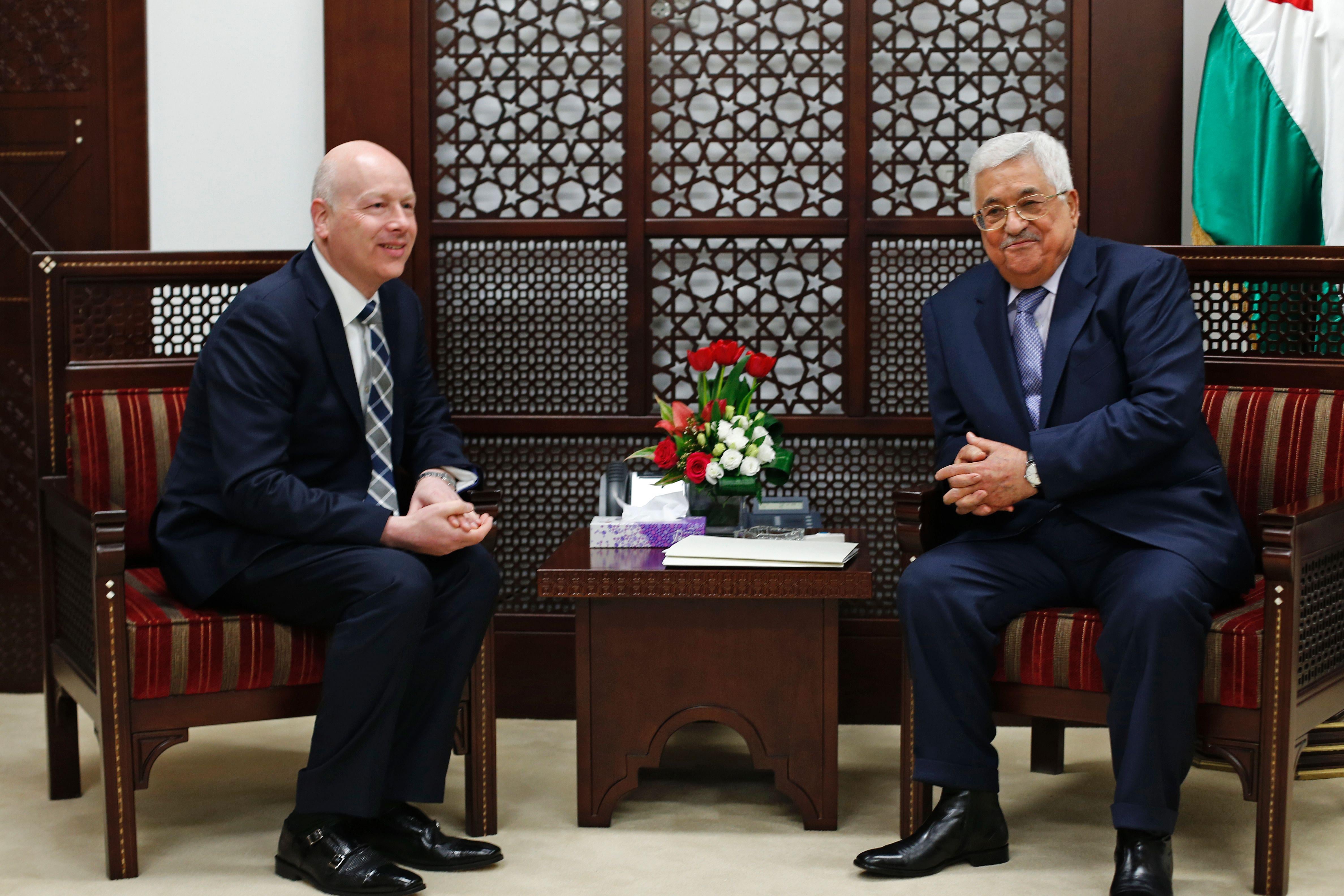 Greenblatt sitting beside Abbas.