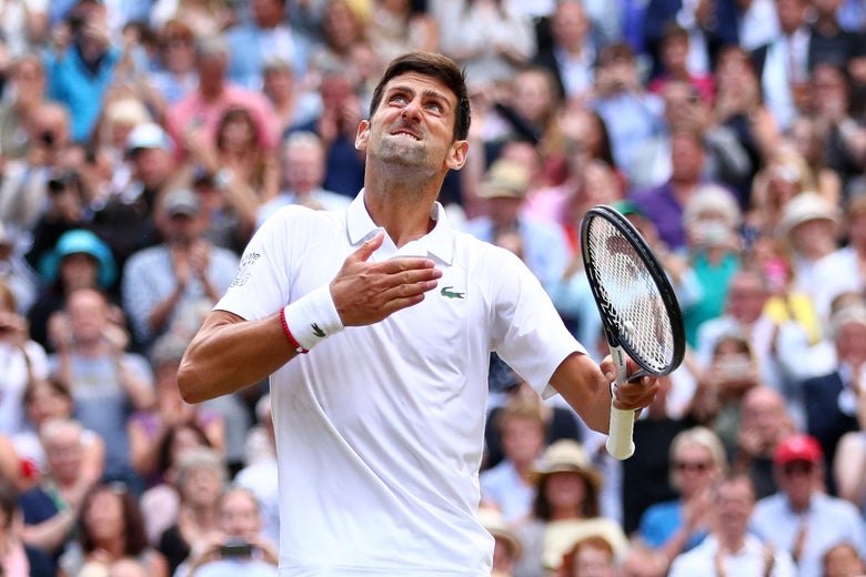 Novak Djokovic celebrates winning Wimbledon.