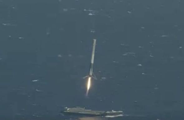 SpaceX successfully lands its Falcon 9 booster on a barge at sea.