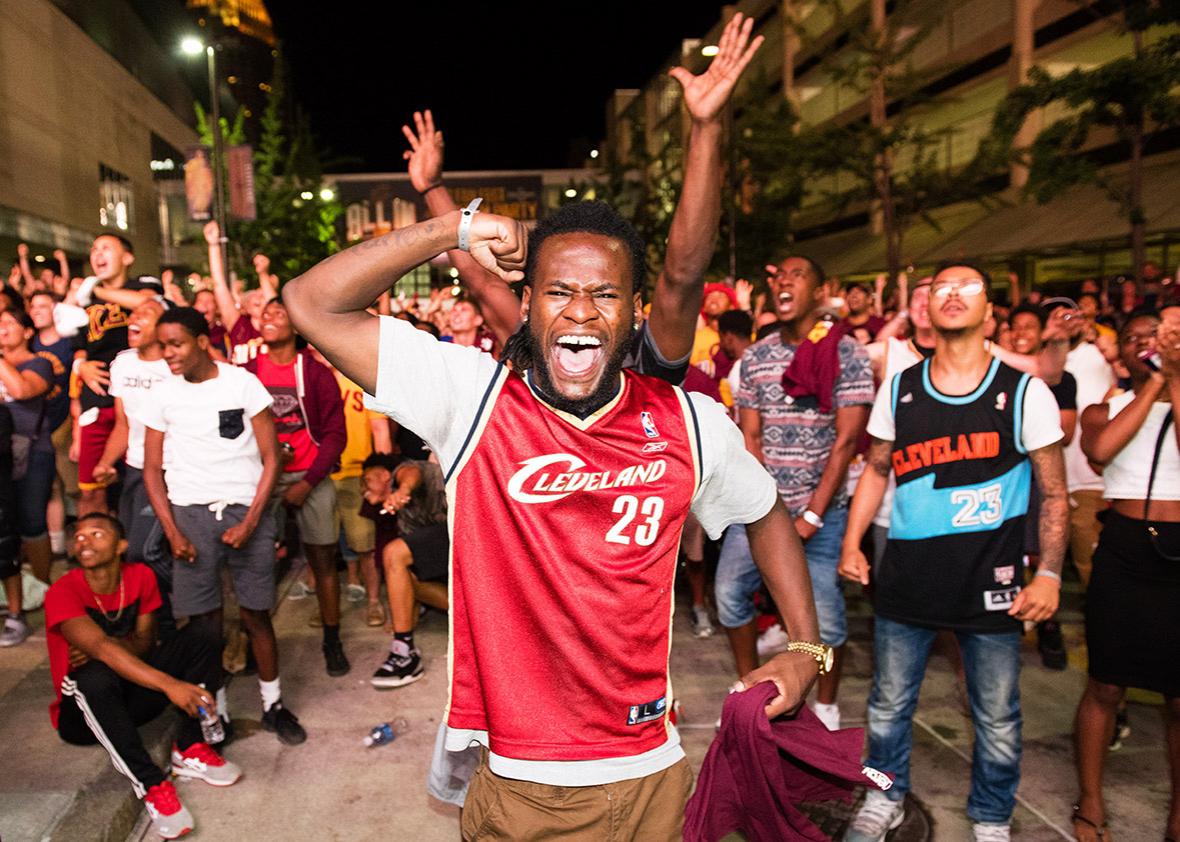 Fans react to a play during the Cleveland Cavaliers NBA Finals Game Seven watch party at Quicken Loans Arena on June 19, 2016 in Cleveland, Ohio.
