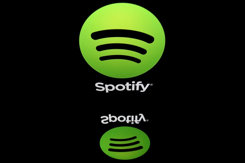 A Spotify logo reflected on a glossy black surface. "Srcset =" https://compote.slate.com/images/204259de-f6fa-495c-83f8-1bcbb14ad29f.jpeg?width=780&height=520&rect=5568x3712&offset=0x0, https://compote.slate.com/images/ 204259de-f6fa-495c-83f8-1bcbb14ad29f.jpeg? width = 780 & height = 520 & rect = 5568x3712 & offset = 0x0 2x