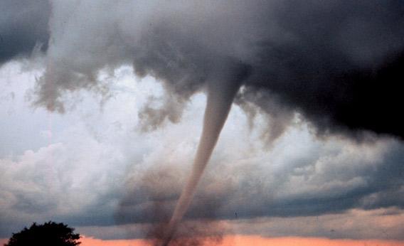 Tornado, a violently rotating column of air that descends from a thunderstorm. 