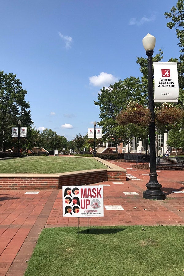 A "mask up" sign on a mostly empty University of Alabama campus.