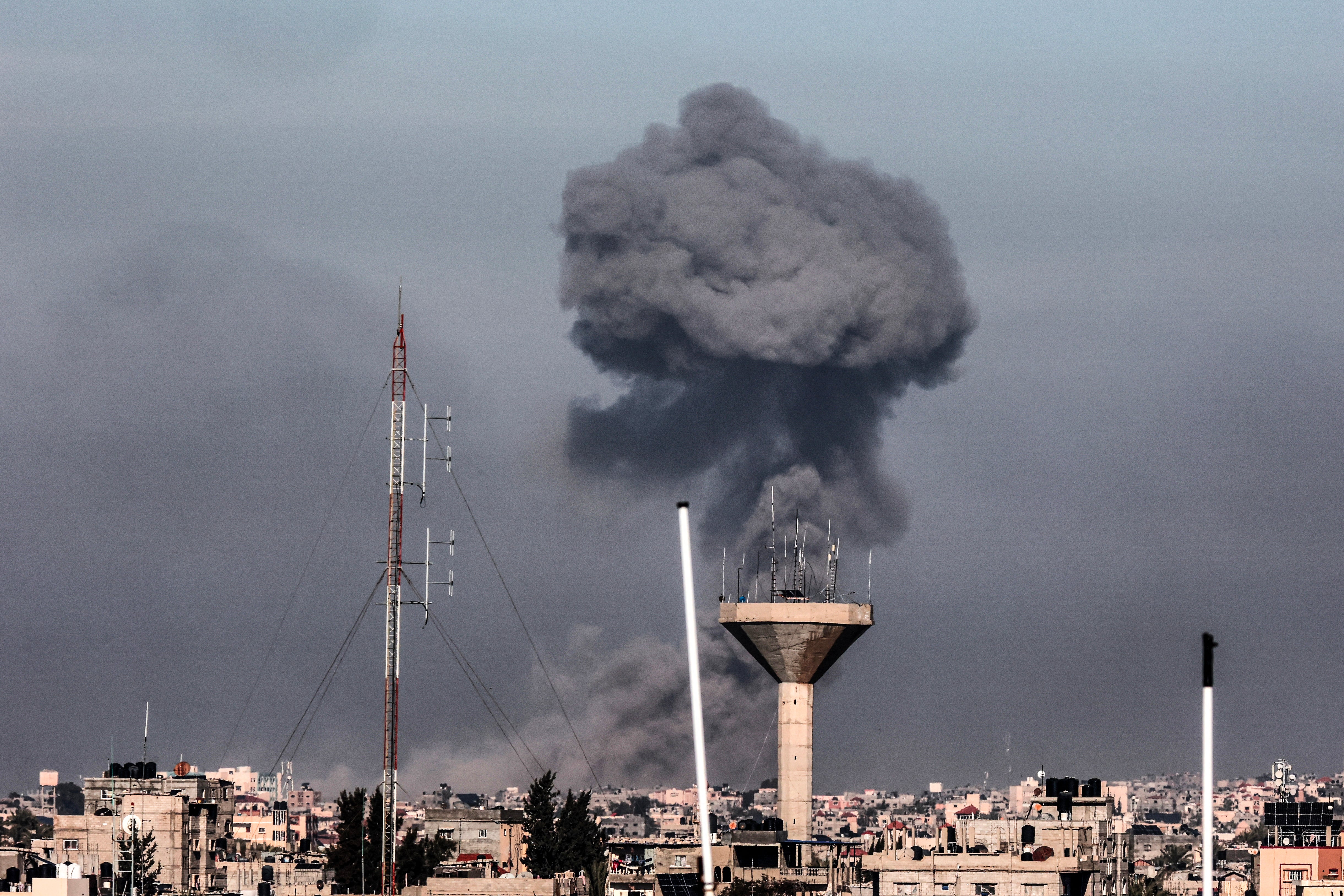 Smoke rising over buildings in Khan Yunis during Israeli bombardment on Feb. 8.