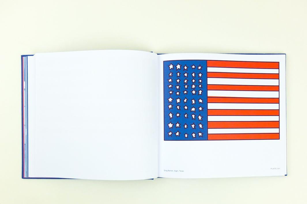 A book showing a flag with all the stars filling up the whole left and all the stripes filling up the whole right side