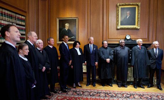 In this handout provided by the White House, U.S. (7th-L) and Vice President Joe Biden (5th-L) meet with Supreme Court Justices (L-R) Associate Justices Samuel Alito, Ruth Bader Ginsburg, Anthony M. Kennedy, John Paul Stevens, Chief Justice John Roberts, President Barack Obama, Associate Justice Sonia Sotomayor, Vice President Joe Biden, Associate Justices Antonin Scalia, Clarence Thomas, Stephen Breyer, and retired Associate Justice David Souter prior to the investiture ceremony for Justice Sonia Sotomayor (6th-L), at the Supreme Court on September 8, 2009 in Washington, DC.