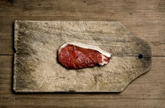 Beef Steak on wood table.