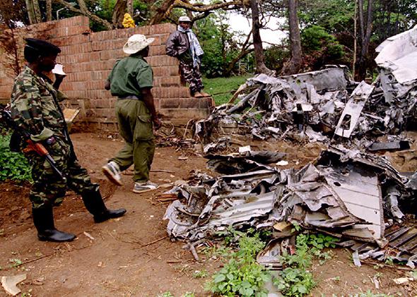 Rwanda Patriotic Front (R.P.F.) rebels inspect the wreckage of the plane in which Rwandan President Juvenal Habyarimana was killed, May 26, 1994.