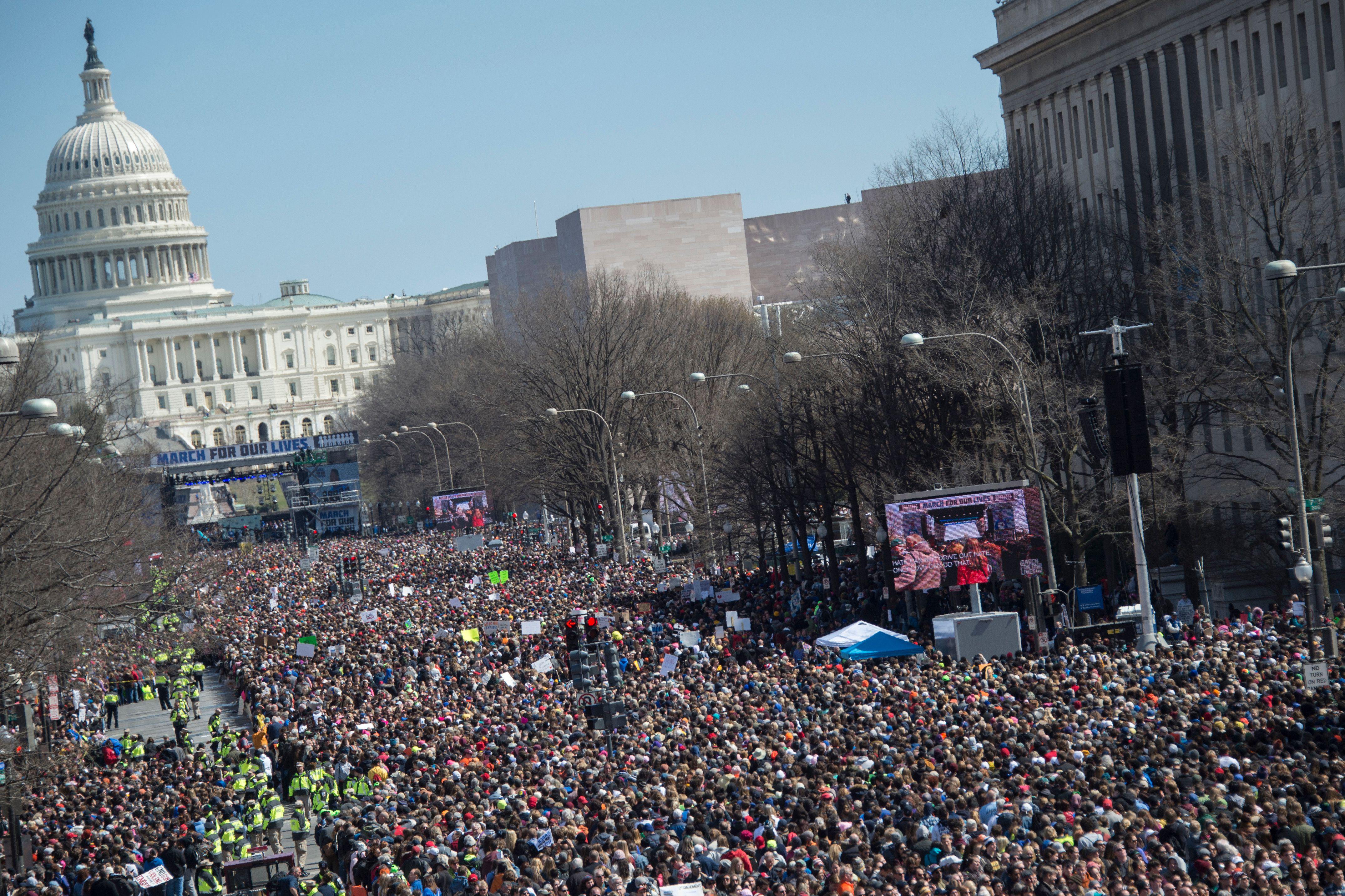 People take part in the March For Our Lives rally against gun violence in Washington, DC on March 24, 2018. 