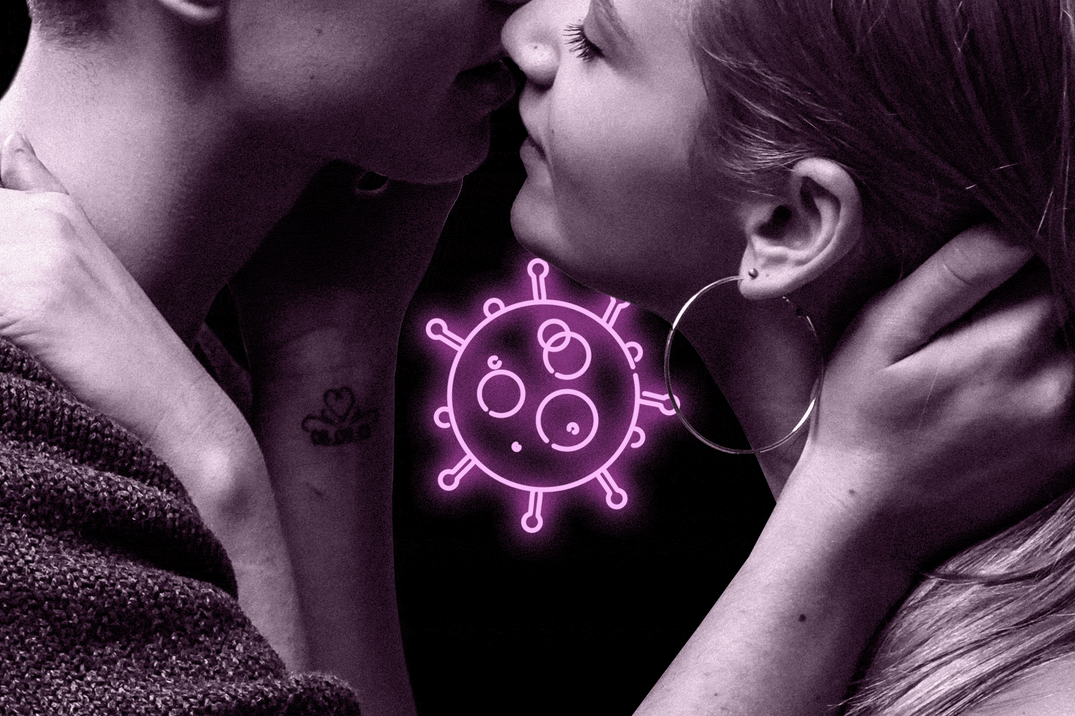 A woman kissing a man, with the COVID-19 virus in neon. 