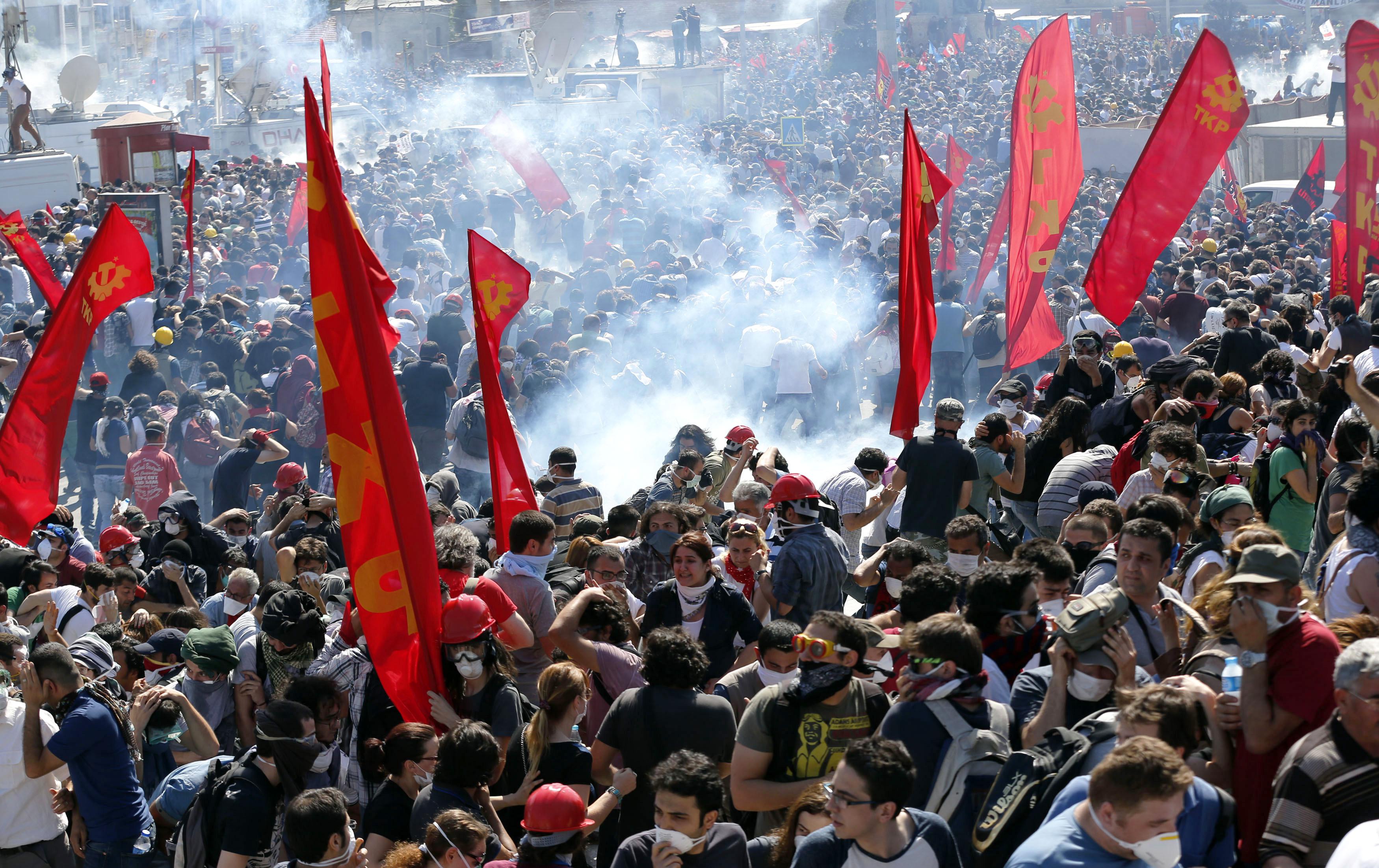Riot police use tear gas to disperse demonstrators during an anti-government protest at Taksim square in central Istanbul June 1, 2013.