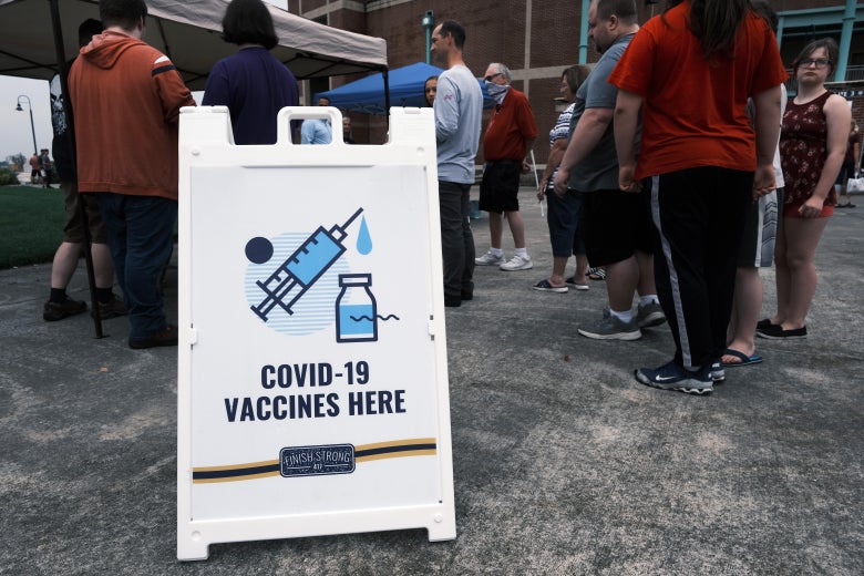 People wait to get vaccinated for Covid-19. 