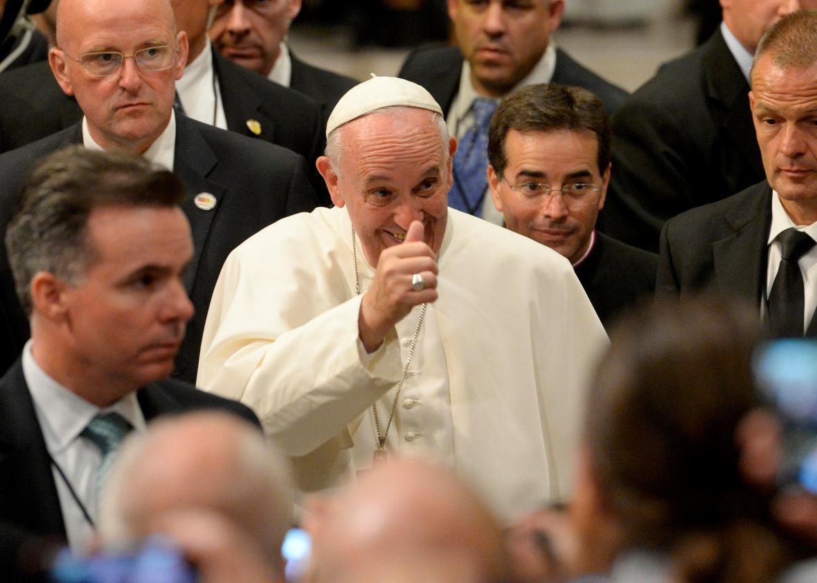 Pope Francis gives a thumbs up as he departs following The Evening Prayer (Vespers) at St. Patrick's Cathedral in New York, September 24, 2015. 