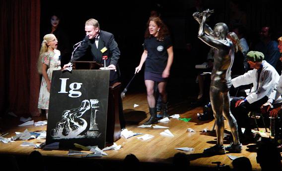 Miss Sweetie Poo confronts Charles Paxton at the 2002 Ig Nobel Prize ceremony at Harvard University.