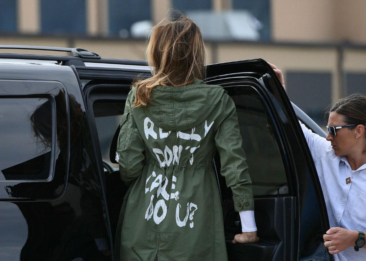 Melania’s jacket is so very Trumpian.