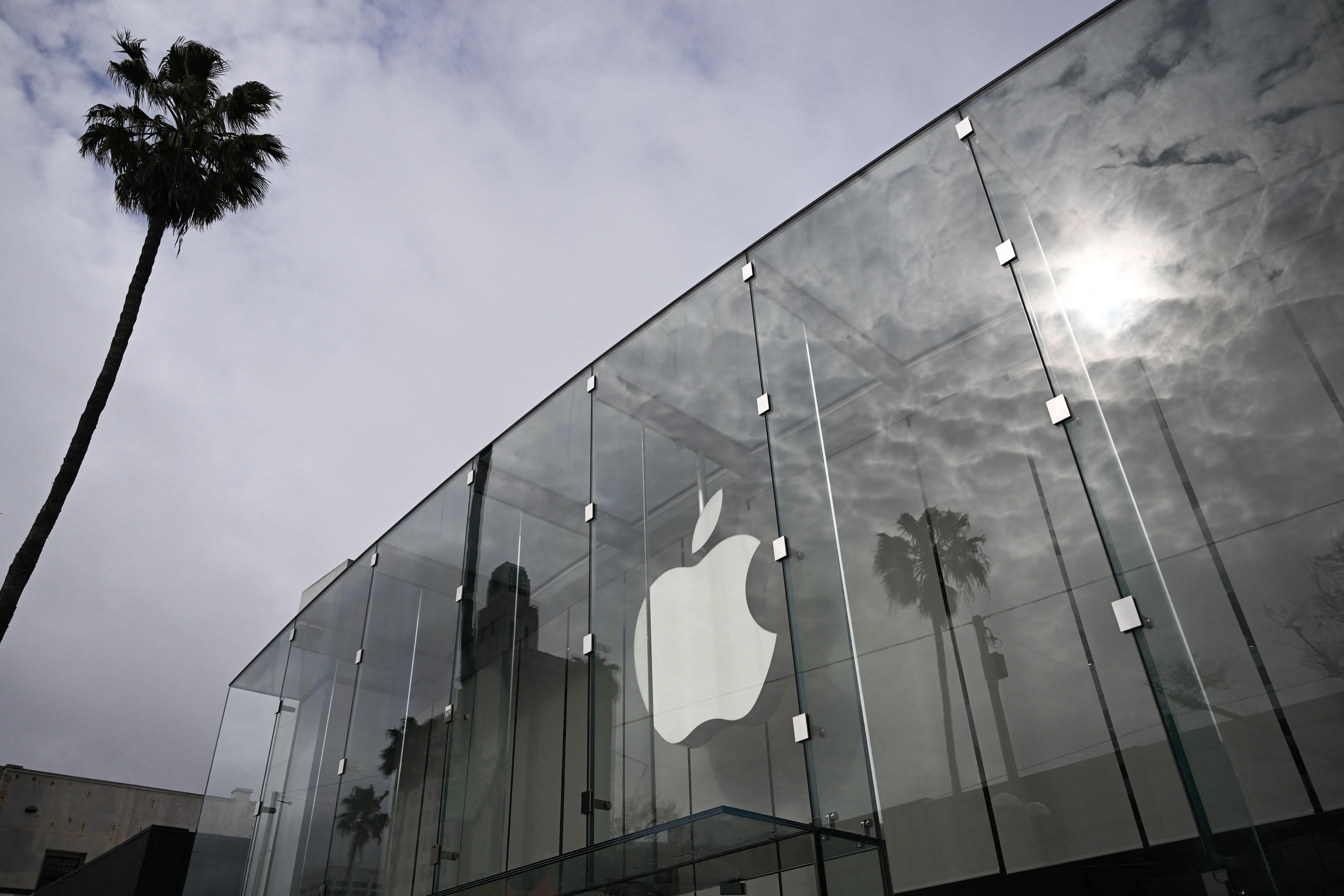 The Apple Inc logo is displayed outside a retail store at the Third Street Promenade in Santa Monica, California on March 20, 2023. (Photo by Patrick T. Fallon / AFP) (Photo by PATRICK T. FALLON/AFP via Getty Images)