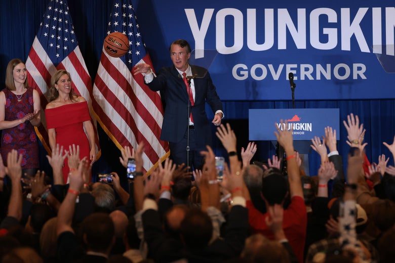 CHANTILLY, VIRGINIA - NOVEMBER 02: Virginia Republican gubernatorial candidate Glenn Youngkin passes an autographed basketball into the crowd with his family at his election night rally at the Westfields Marriott Washington Dulles on November 02, 2021 in Chantilly, Virginia. Virginians went to the polls Tuesday to vote in the gubernatorial race that pitted Youngkin against Democratic gubernatorial candidate, former Virginia Gov. Terry McAuliffe. (Photo by Chip Somodevilla/Getty Images)