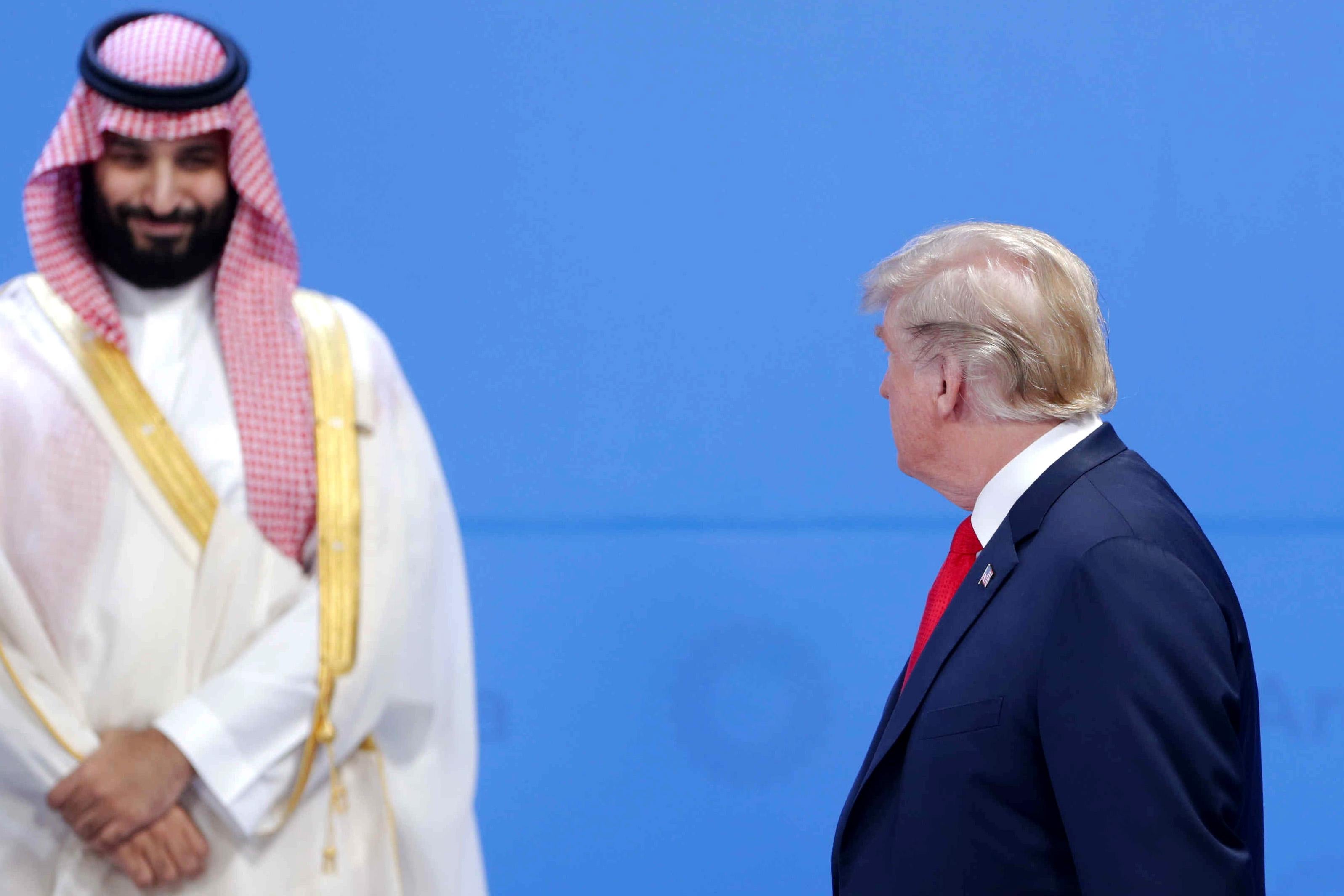 President Donald Trump looks over at Crown Prince of Saudi Arabia Mohammad bin Salman during a G-20 summit.