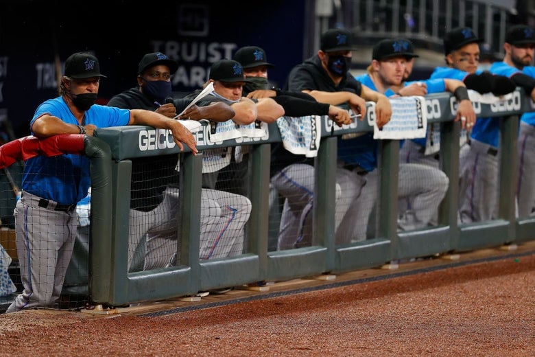Thirteen Miami Marlins test positive for COVID-19 as MLB season, U.S. pandemic approach in general look dicey.