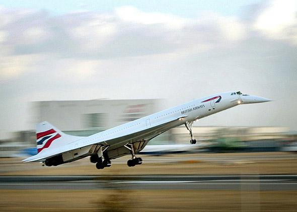 The last British Airways passenger Concorde flight lands at London's Heathrow Airport from New York on Oct. 24, 2003. 