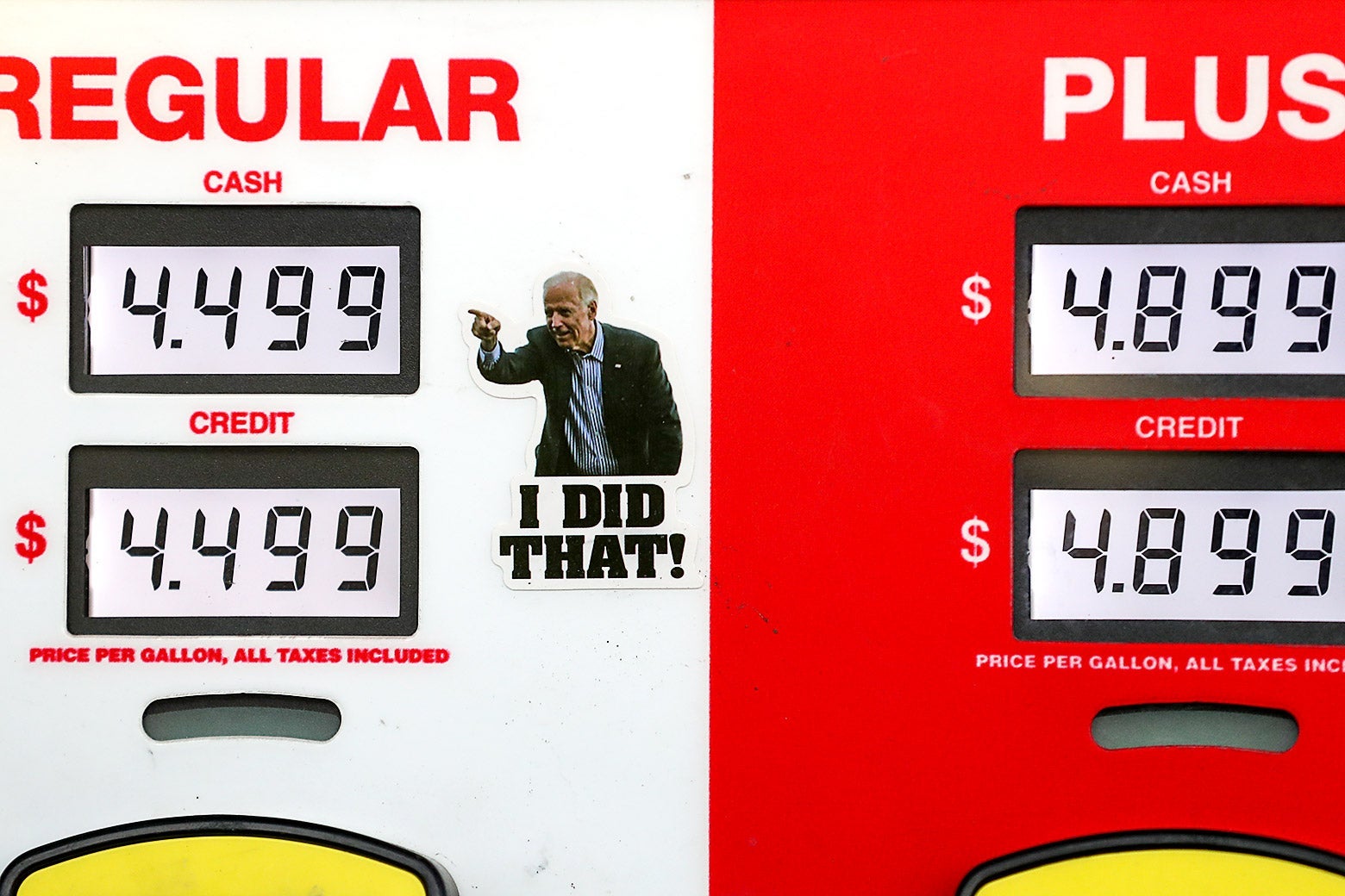 A gas pump where the price is shown as $4.499, with a Biden sticker pointing to it.