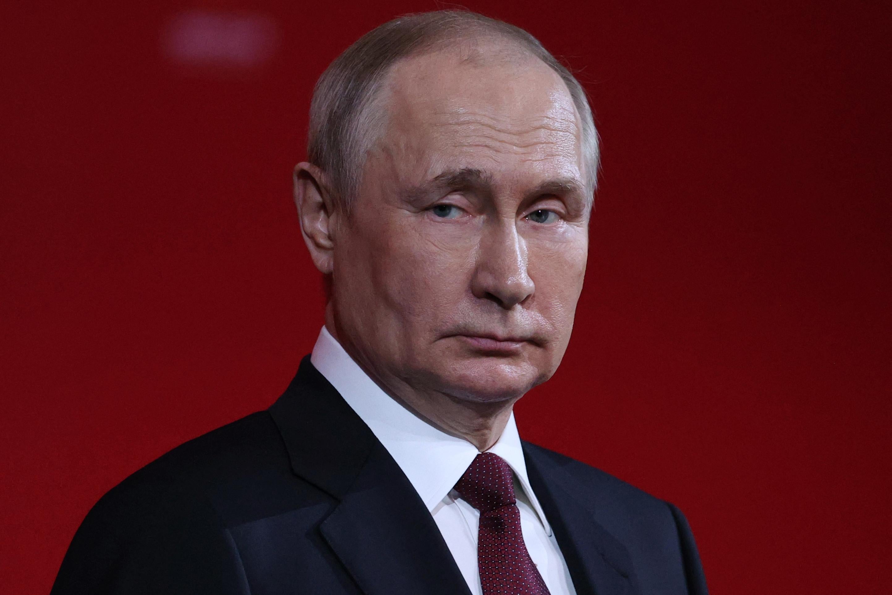 Putin grimacing.