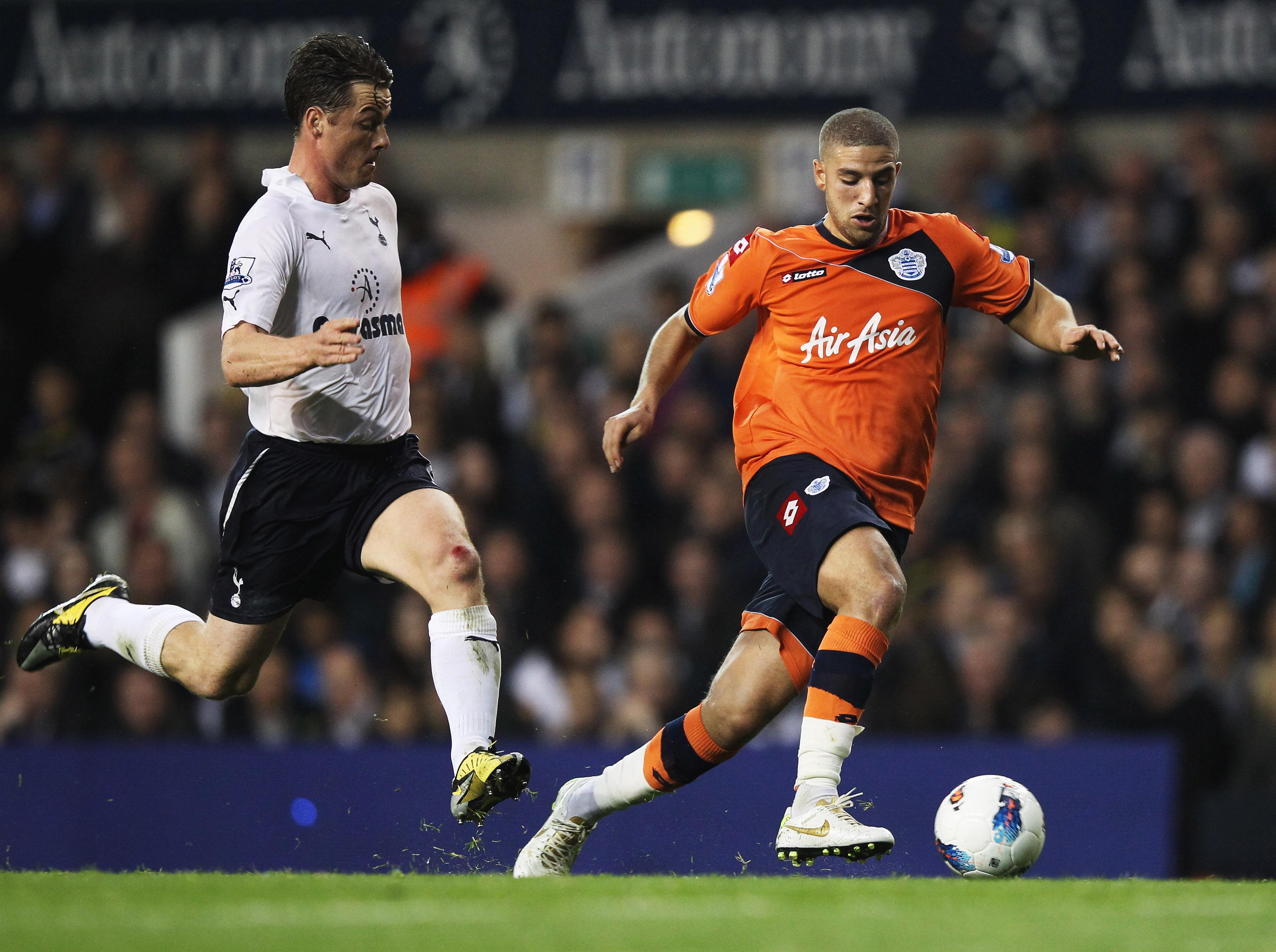 Adel Taarabt of Queens Park Rangers is chased by Scott Parker of Tottenham Hotspur during the Barclays Premier .