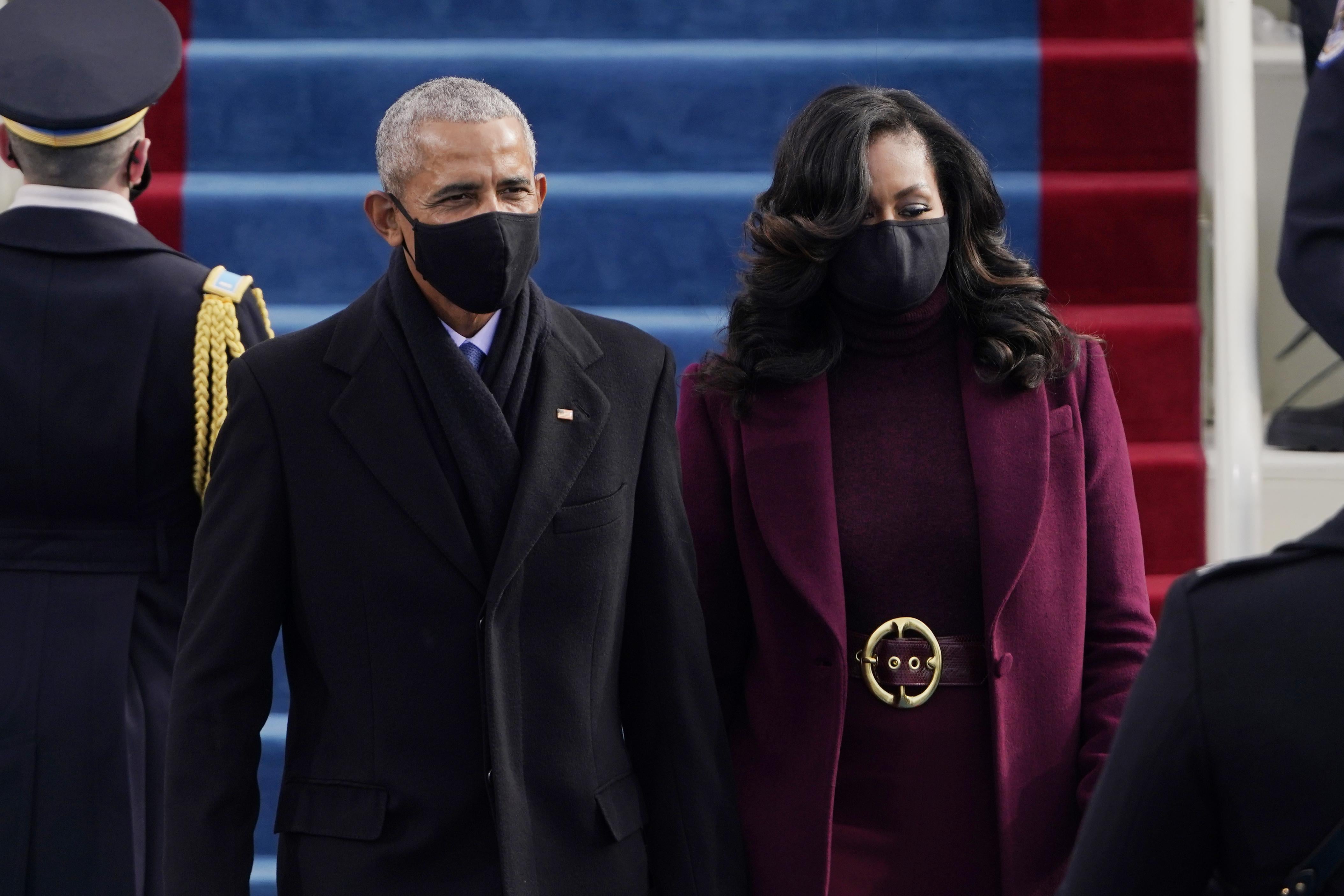 Former President Barack Obama and his wife Michelle arrive for the 59th inaugural ceremony on the West Front of the U.S. Capitol on January 20, 2021 in Washington, D.C.