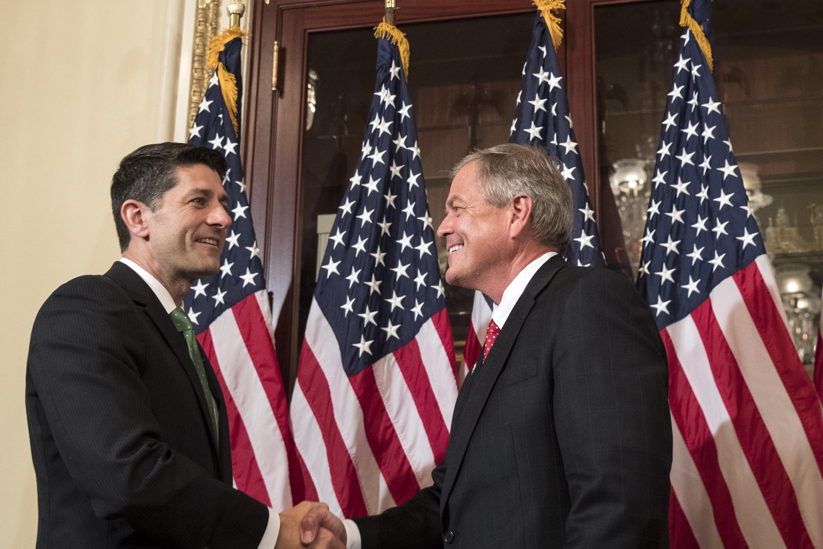 Speaker of the House Paul Ryan shakes hands with Representative-elect Ralph Norman (R-SC) during in a ceremonial swearing-in on Capitol Hill, June 26, 2017 in Washington, D.C.