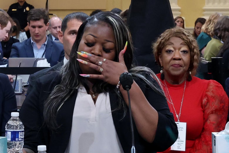 WASHINGTON, DC - JUNE 21: Wandrea ArShaye “Shaye” Moss, former Georgia election worker, becomes emotional while testifying as her mother Ruby Freeman watches during the fourth hearing held by the Select Committee to Investigate the January 6th Attack on the U.S. Capitol on June 21, 2022 in the Cannon House Office Building in Washington, DC. The bipartisan committee, which has been gathering evidence related to the January 6, 2021 attack at the U.S. Capitol for almost a year, is presenting its findings in a series of televised hearings. On January 6, 2021, supporters of President Donald Trump attacked the U.S. Capitol Building in an attempt to disrupt a congressional vote to confirm the electoral college win for Joe Biden. (Photo by Michael Reynolds-Pool/Getty Images)