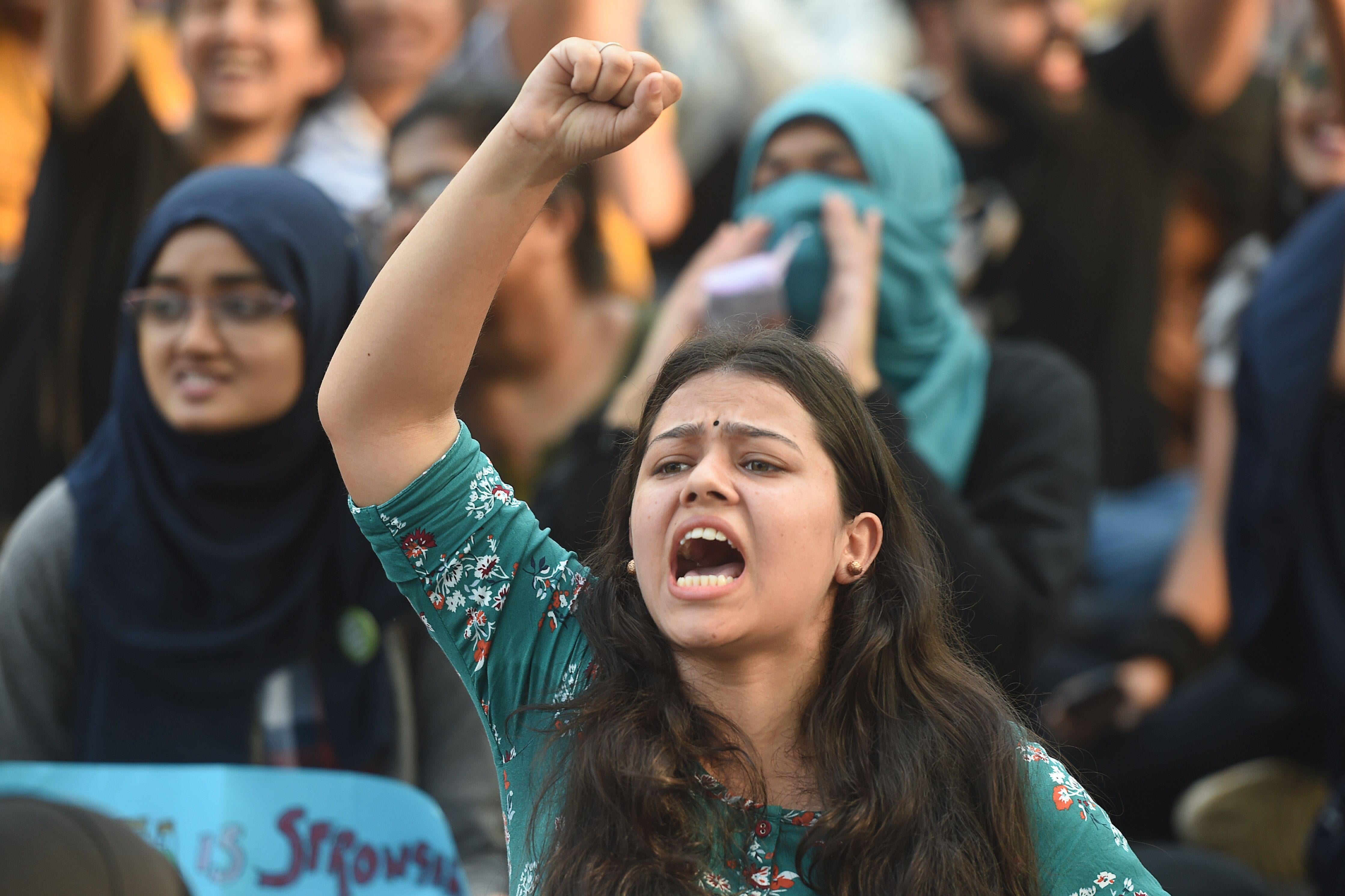 A female protester shouts at a demonstration in Mumbai.
