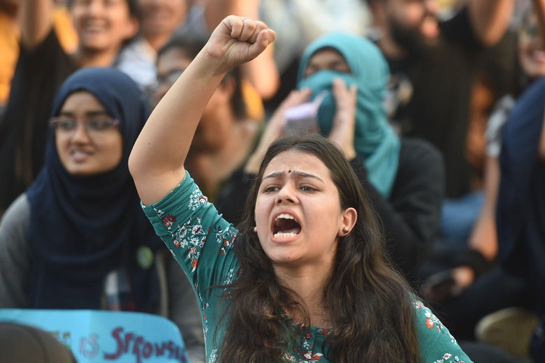 A female protester shouts at a demonstration in Mumbai.