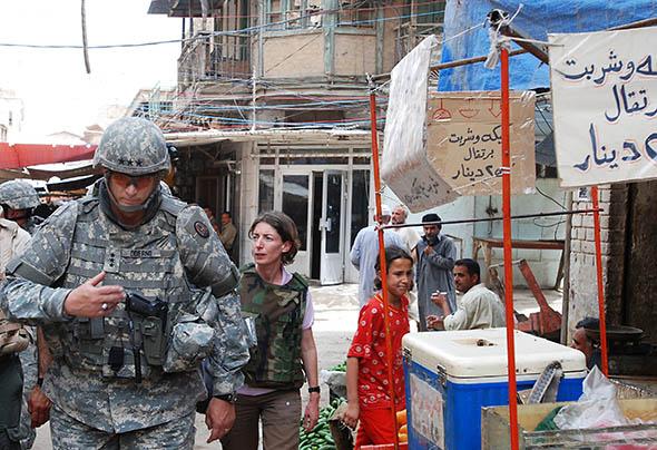 Sky walking through a market in Baghdad with Odierno.