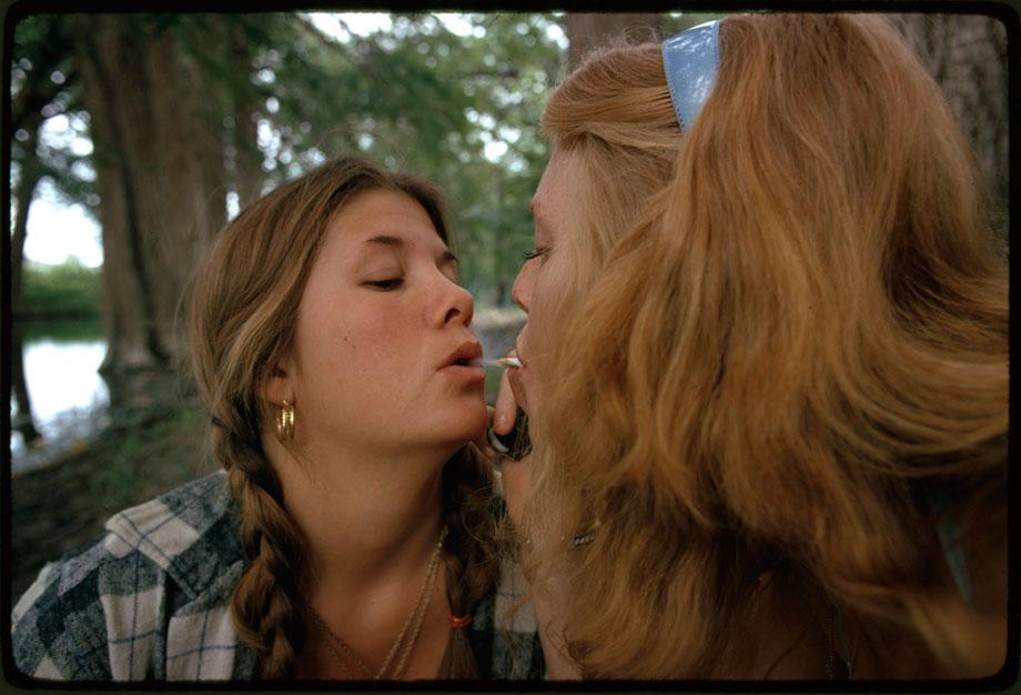 Two girls smoking pot during an outing in cedar woods near Leaky, Texas (taken with permission), one of nine pictures near San Antonio," May 1973Photographer: M. St. GilSeries: Photographs and other Graphic Materials from the Environmental Protection Agency, (12/09/1970-)Record Group 412: Records of the Environmental Protection Agency, 1944-2006ARC Series Identifier: 554907Still Pictures Identifier: 412-DA-12455Rediscovery Identifier: 25282