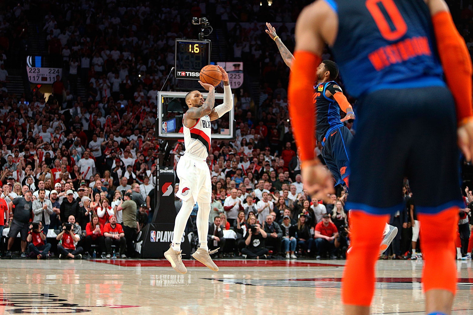 Damian Lillard shoots the game-winning three-pointer to beat the Oklahoma City Thunder 118-115 in Game 5 of the first round of the NBA Playoffs on April 23, 2019.