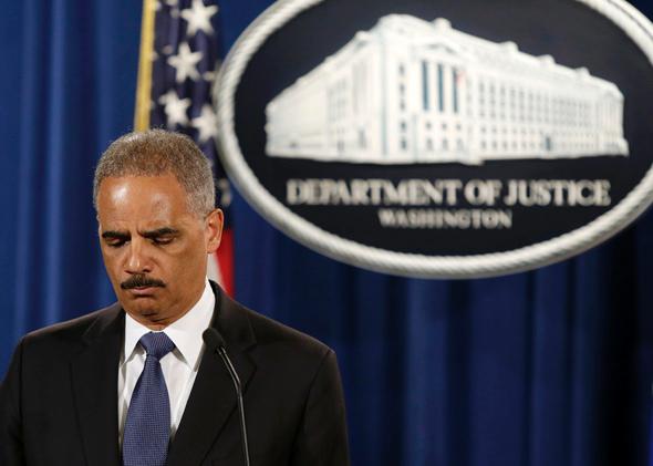 Attorney General Eric Holder holds a news conference announcing updates in the Justice Department's investigation of the shooting of Michael Brown in Washington, D.C., on Sept. 4, 2014