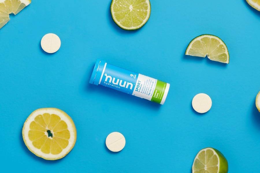 Nuun tablets surrounded by lime slices
