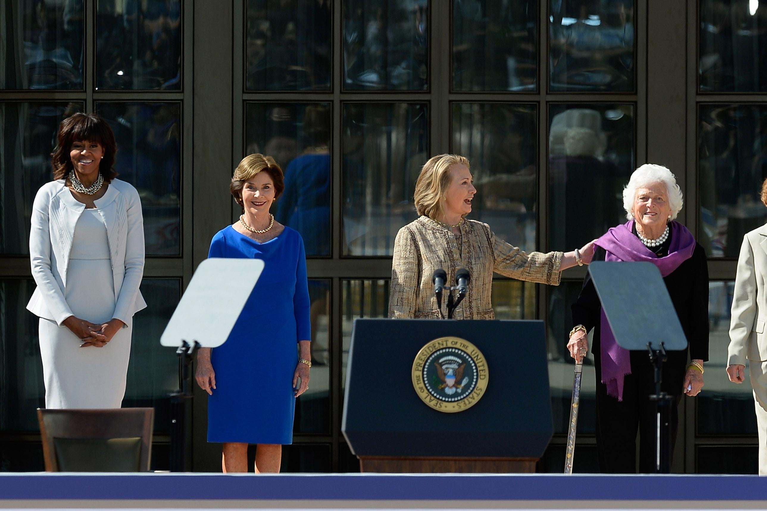 DALLAS, TX - APRIL 25: (L-R) First lady Michelle Obama, former first lady Laura Bush, former first lady Hillary Clinton, former first lady Barbara Bush and former first lady Rosalynn Carter are introduced during the opening ceremony of the George W. Bush Presidential Center April 25, 2013 in Dallas, Texas. The Bush library, which is located on the campus of Southern Methodist University, with more than 70 million pages of paper records, 43,000 artifacts, 200 million emails and four million digital photographs, will be opened to the public on May 1, 2013. The library is the 13th presidential library in the National Archives and Records Administration system.  (Photo by Kevork Djansezian/Getty Images)