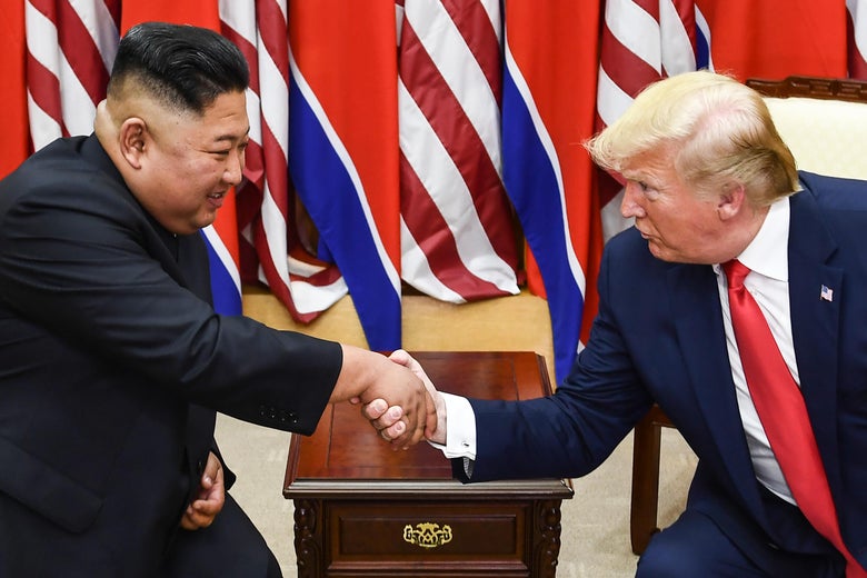 North Korea's leader Kim Jong Un and President Donald Trump shake hands during a meeting on the south side of the Military Demarcation Line that divides North and South Korea, in the Joint Security Area (JSA) of Panmunjom in the Demilitarized zone (DMZ) on June 30, 2019.