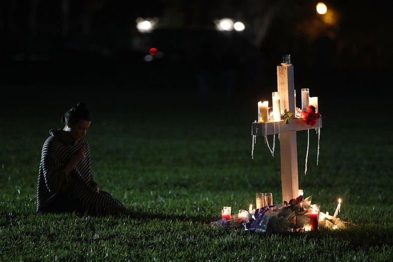 A former Douglas student during a vigil for victims of the mass shooting at Marjory Stoneman Douglas High School at Pine Trail Park, on February 15, 2018 in Parkland, Florida. 
