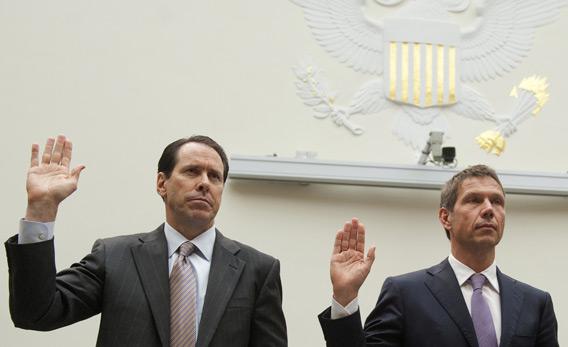 AT&T CEO Randall Stephenson (left) and Deutsche Telekom CEO Rene Obermann are sworn in before a House hearing on the proposed merger of the telecom giants