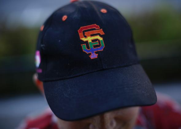 A baseball cap with a rainbow-colored San Francisco giants logo