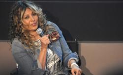 Actress Pam Grier speaks onstage at the "Foxy, The Complete Pam Grier" Film Series at Walter Reade Theater on March 15, 2013 in New York City.  (Photo by Michael Loccisano/Getty Images)