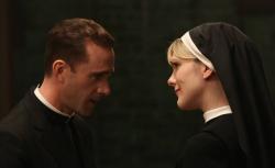 Joseph Fiennes as Monsignor Timothy Howard and Lily Rabe as Sister Eunice in 'American Horror Story: Asylum.'