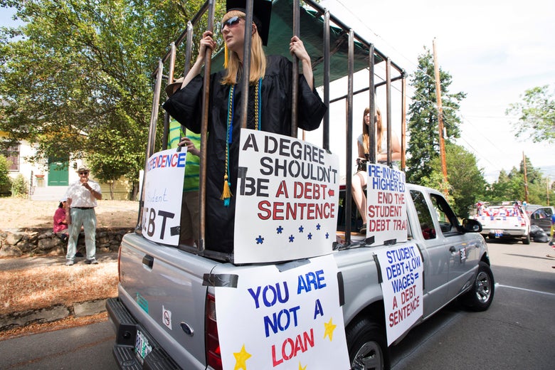 A demonstrator protests over student debt.