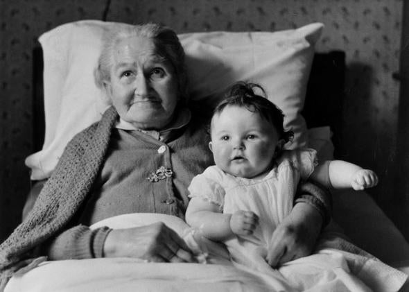Eighty three year old Margaret Roberts with her eight month old great-great-granddaughter, February 1959.