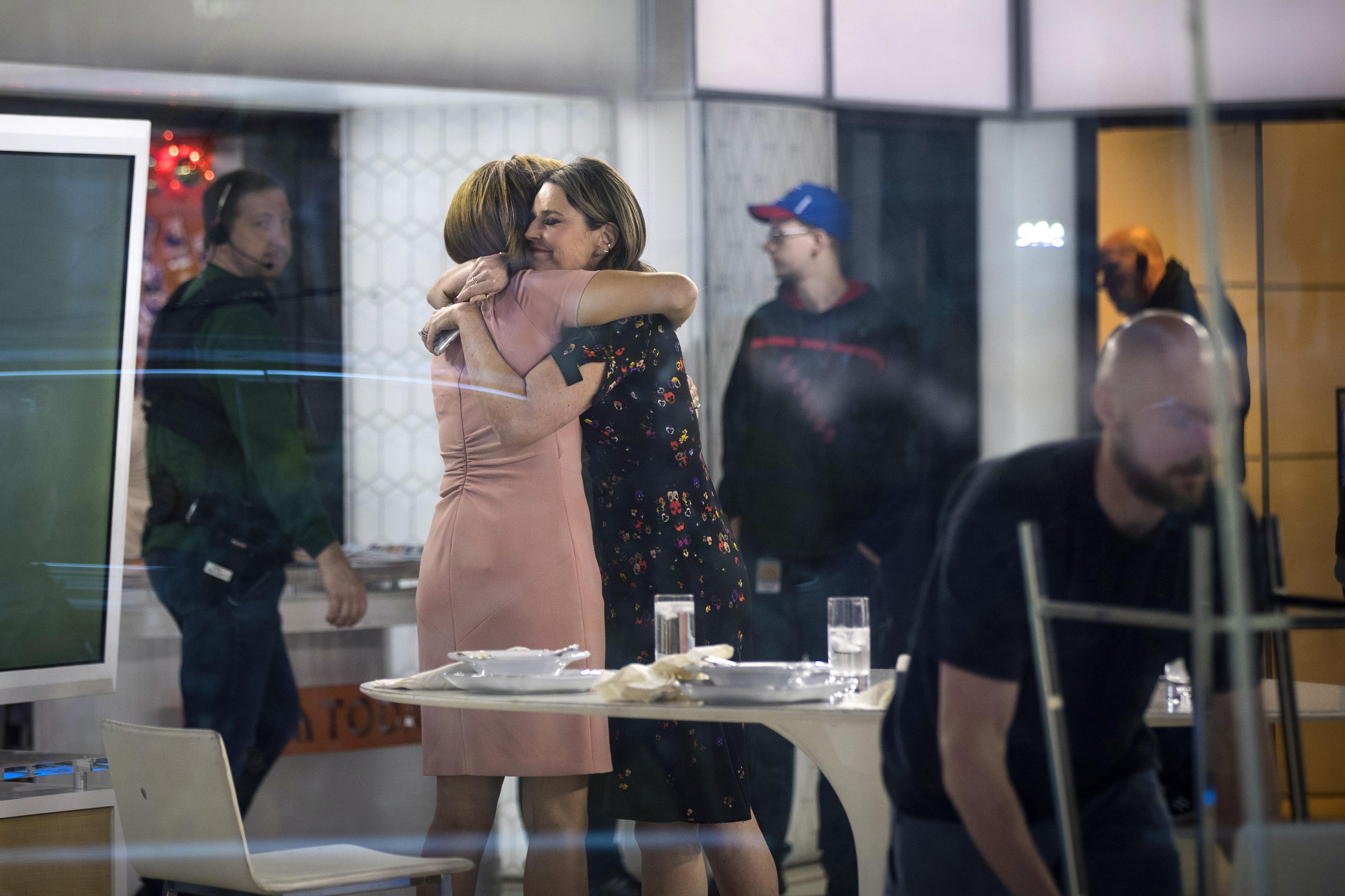 NEW YORK, NY - NOVEMBER 29: (L to R) Hoda Kotb and Savannah Guthrie embrace at the end of the show on the set of NBC's Today Show, November 29, 2017 in New York City. It was announced on Wednesday morning that long time Today Show host Matt Lauer had been fired for sexual misconduct. (Photo by Drew Angerer/Getty Images)
