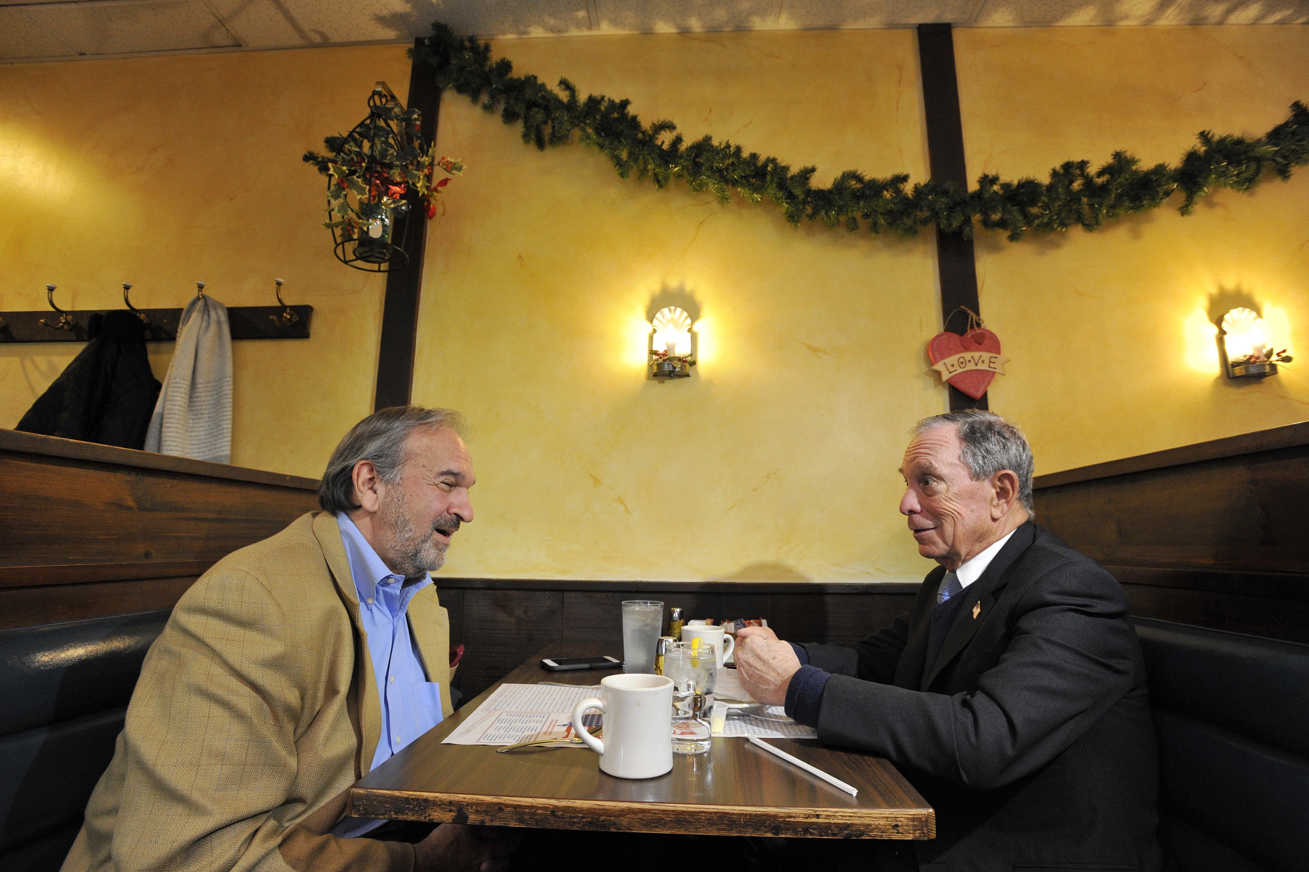 Bloomberg talking to Billy Shaheen over coffee in a diner booth.